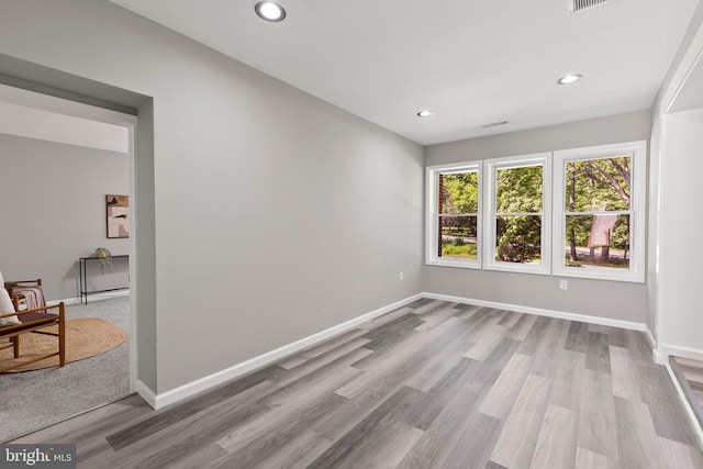 708 E Seminary, Towson, MD 21286 - spare room featuring wood finished floors and recessed lighting
