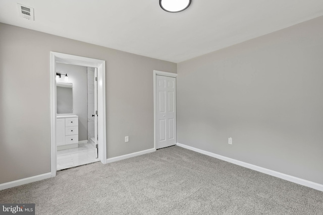708 E Seminary, Towson, MD 21286 - unfurnished bedroom with carpet flooring, a closet, and ensuite bath