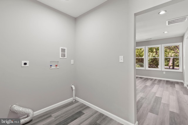 708 E Seminary, Towson, MD 21286 - laundry room featuring electric dryer hookup, wood finished floors, hookup for a washing machine, and recessed lighting