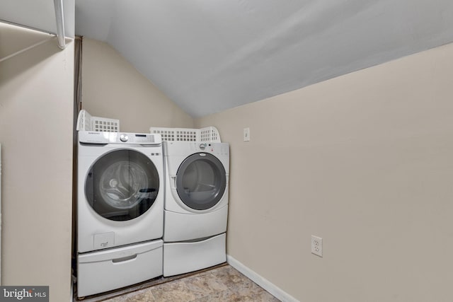 9216 Spring Acres Rd, Clinton, MD 20735 - laundry area featuring washer and dryer and stone finish flooring