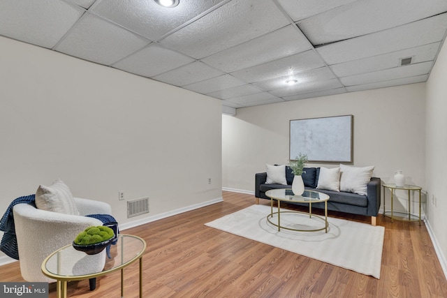 9216 Spring Acres Rd, Clinton, MD 20735 - living area featuring a drop ceiling and wood finished floors