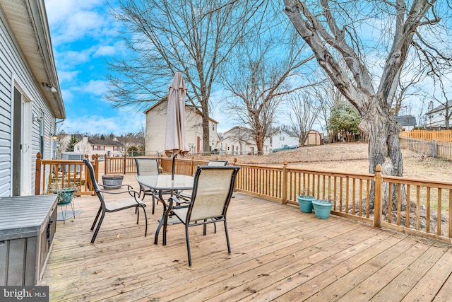 9216 Spring Acres Rd, Clinton, MD 20735 - deck with outdoor dining space, a fenced backyard, and a residential view