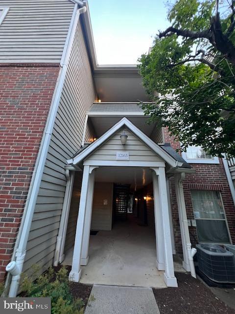12163 Penderview Ter Unit 1034, Fairfax, VA 22033 - exterior space with brick siding
