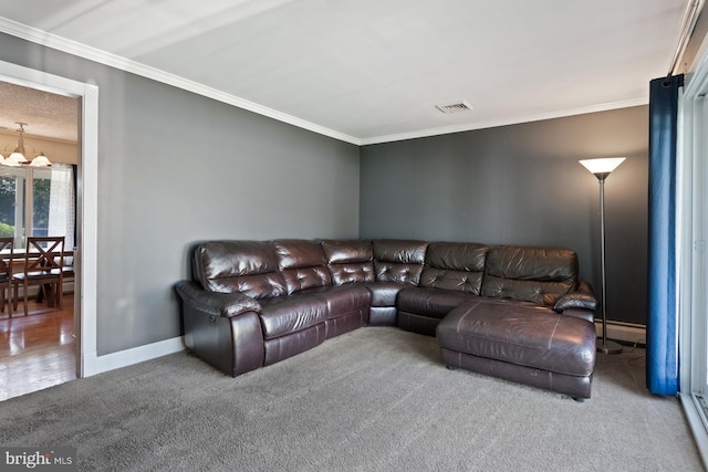 25 Tulip Ln, Levittown, PA 19054 - carpeted living area featuring ornamental molding, a chandelier, and baseboard heating