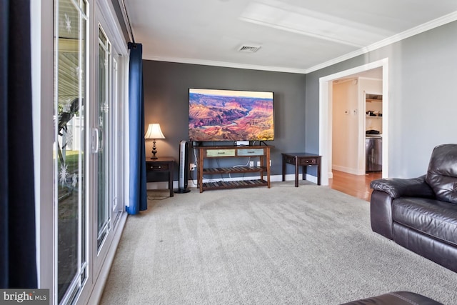 25 Tulip Ln, Levittown, PA 19054 - carpeted living room with ornamental molding and baseboards