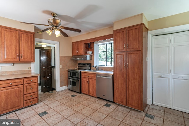 722 River Rd, Ewing, NJ 08628 - kitchen with appliances with stainless steel finishes, under cabinet range hood, brown cabinetry, and a ceiling fan