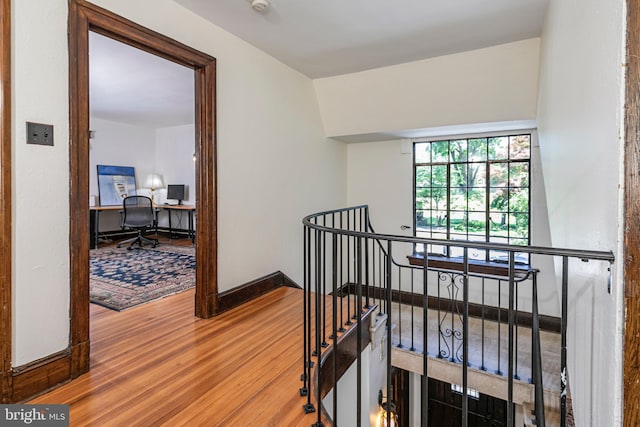 722 River Rd, Ewing, NJ 08628 - corridor featuring an upstairs landing, wood finished floors, and a desk