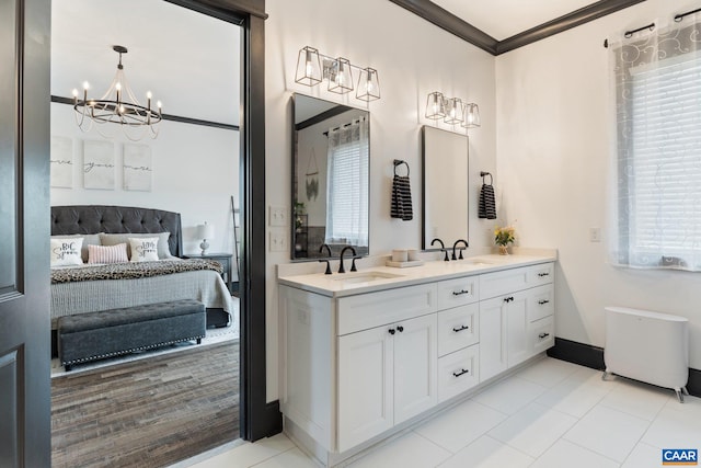 1 Cross County Rd, Mineral, VA 23117 - ensuite bathroom with double vanity, ornamental molding, a chandelier, healthy amount of natural light, and tile patterned flooring