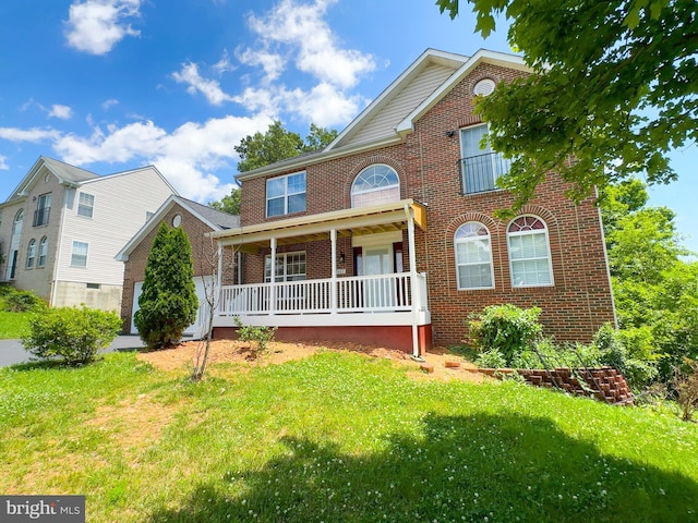 7403 Hawthorne St, Landover, MD 20785 - view of front facade with brick siding, covered porch, and a front lawn