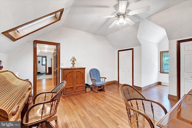 59 Segovia Ct, Hanover, PA 17331 - living area with a skylight, light wood-style floors, ceiling fan, and vaulted ceiling