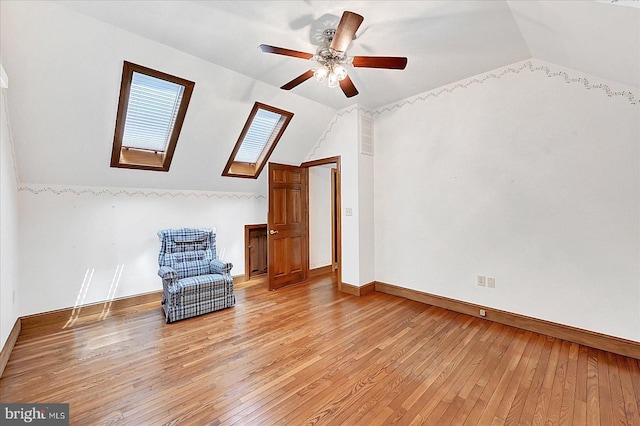 59 Segovia Ct, Hanover, PA 17331 - unfurnished room with lofted ceiling, light wood finished floors, a skylight, and a ceiling fan