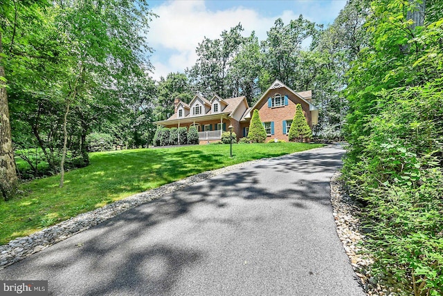 59 Segovia Ct, Hanover, PA 17331 - view of front of home featuring a front lawn and brick siding