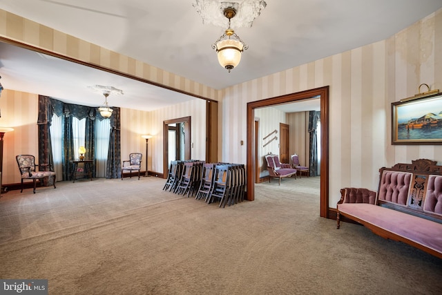 2505-2507 High St, Port Norris, NJ 08349 - living area with wallpapered walls, carpet floors, and a chandelier