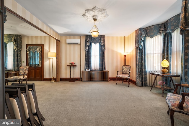 2505-2507 High St, Port Norris, NJ 08349 - sitting room featuring radiator, a wall unit AC, wallpapered walls, healthy amount of natural light, and carpet flooring