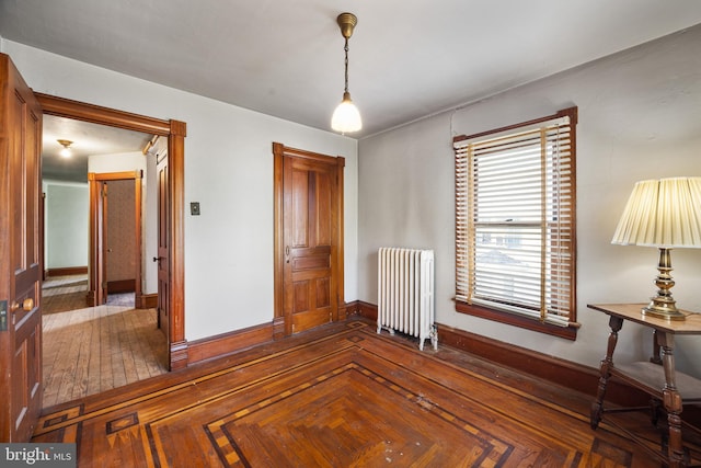 2505-2507 High St, Port Norris, NJ 08349 - empty room with radiator heating unit and baseboards