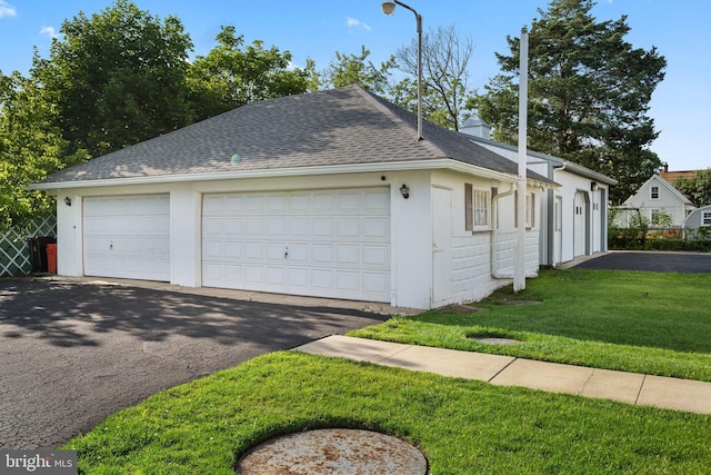 2505-2507 High St, Port Norris, NJ 08349 - view of front of property with a front yard, roof with shingles, and a garage