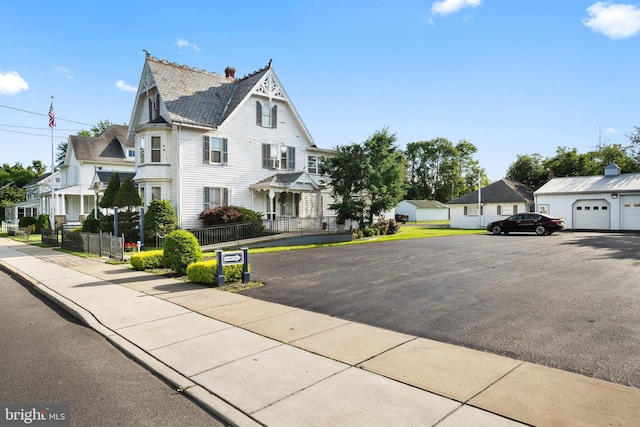 2505-2507 High St, Port Norris, NJ 08349 - view of side of property with a residential view, a chimney, and a garage