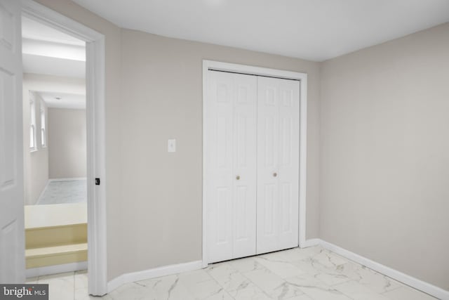 1614 Maryland Ave, Woodbridge, VA 22191 - unfurnished bedroom with light marble finish floors and a closet