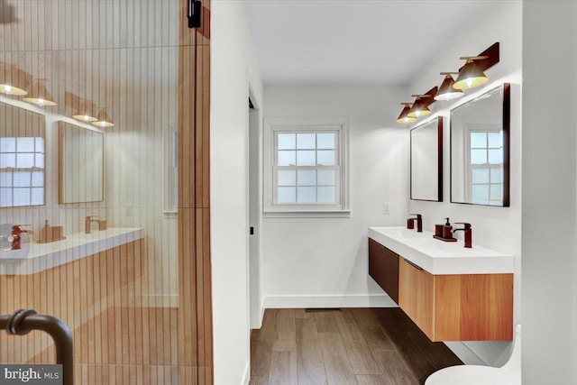 109 Wyomissing Blvd, Wyomissing, PA 19610 - full bath with plenty of natural light, wood finished floors, and vanity