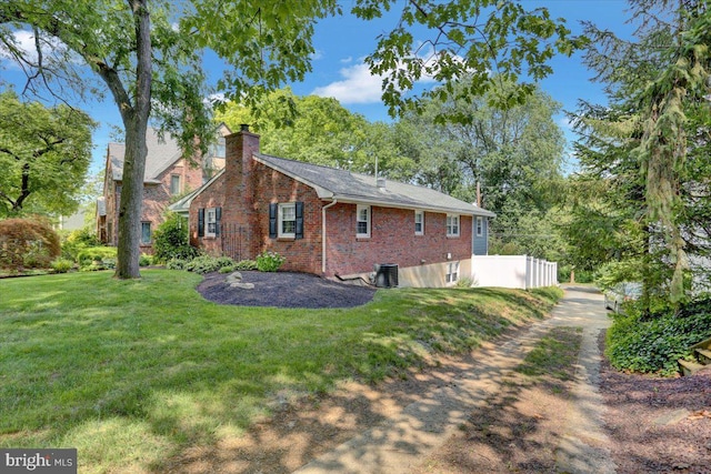 109 Wyomissing Blvd, Wyomissing, PA 19610 - view of side of property with a yard, brick siding, and a chimney