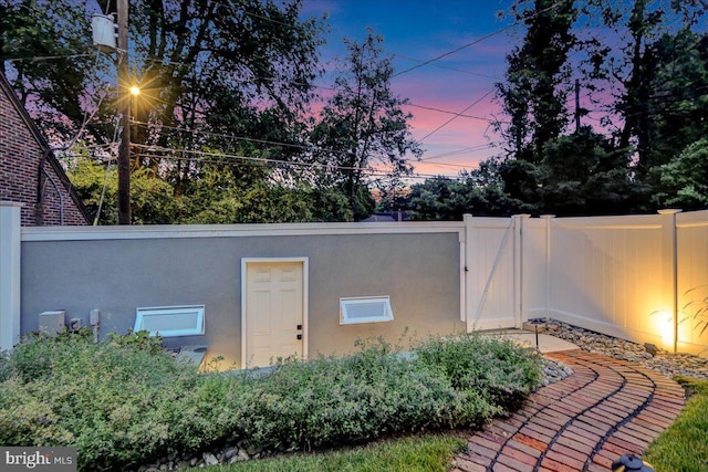 109 Wyomissing Blvd, Wyomissing, PA 19610 - yard at dusk with a gate
