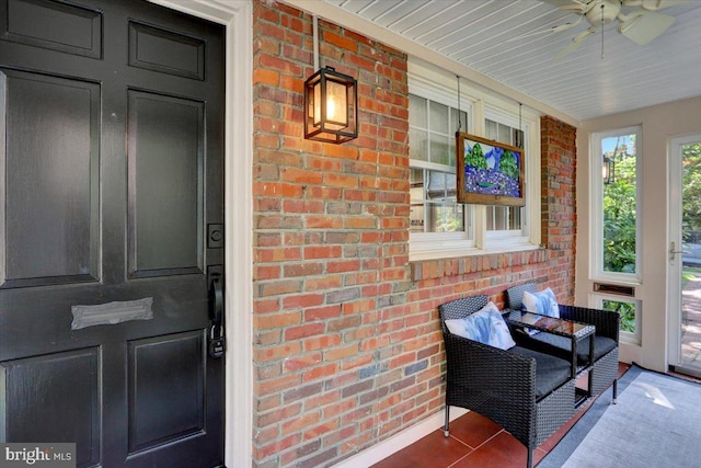 109 Wyomissing Blvd, Wyomissing, PA 19610 - property entrance featuring brick siding, covered porch, and ceiling fan