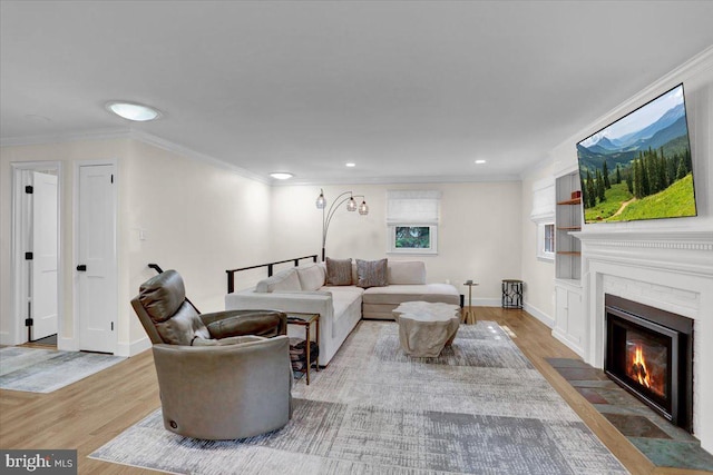 109 Wyomissing Blvd, Wyomissing, PA 19610 - living room with wood finished floors, a fireplace with flush hearth, ornamental molding, and recessed lighting