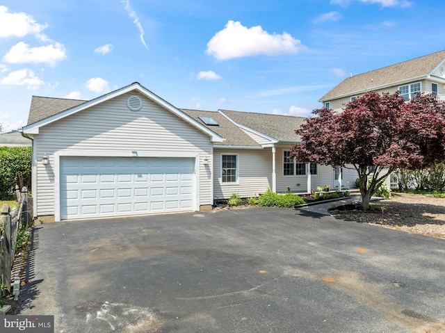 935 Mallard Dr, Lanoka Harbor, NJ 08734 - view of front of property with an attached garage, asphalt driveway, and a shingled roof