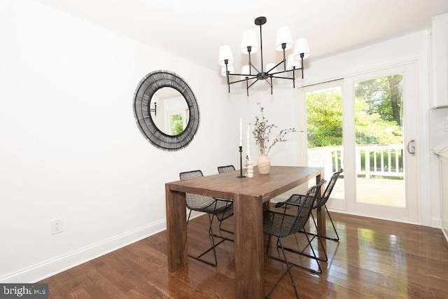 19023 Staleybridge Rd, Germantown, MD 20876 - dining area featuring a chandelier and dark wood-style floors