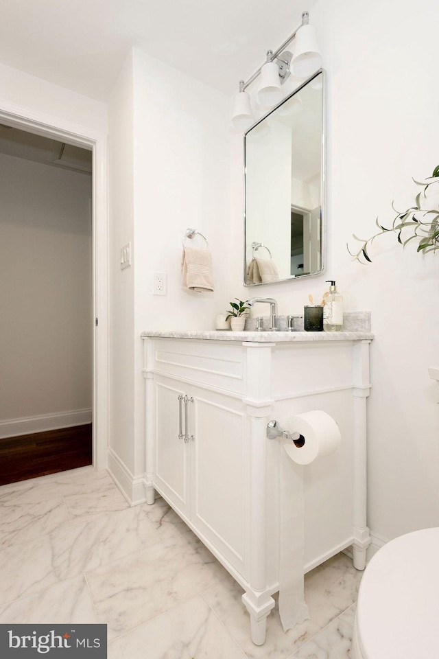 19023 Staleybridge Rd, Germantown, MD 20876 - bathroom with marble look tile flooring and vanity