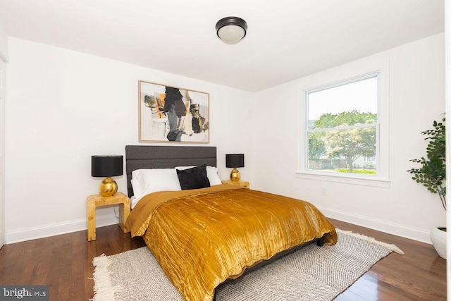 19023 Staleybridge Rd, Germantown, MD 20876 - bedroom with baseboards and wood finished floors