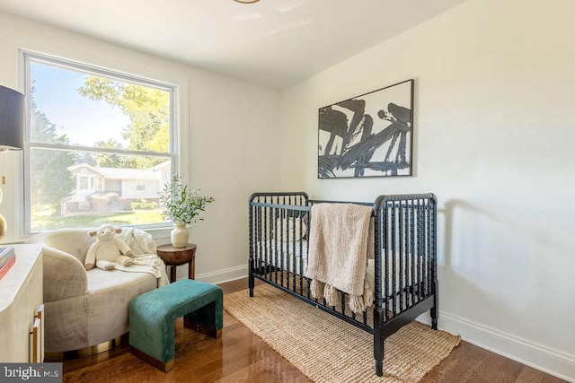 19023 Staleybridge Rd, Germantown, MD 20876 - bedroom featuring wood finished floors and baseboards