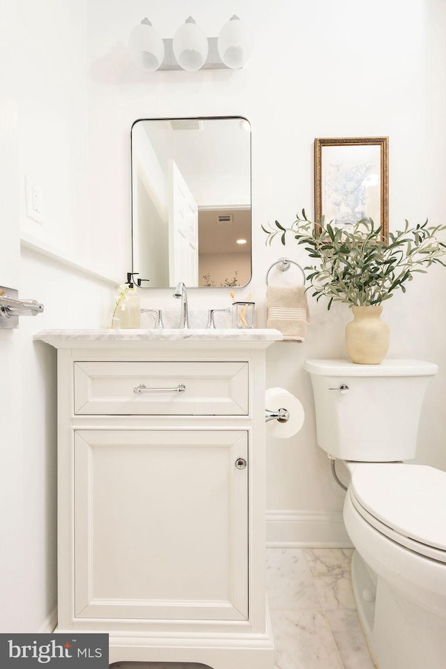 19023 Staleybridge Rd, Germantown, MD 20876 - bathroom with marble look tile flooring and vanity