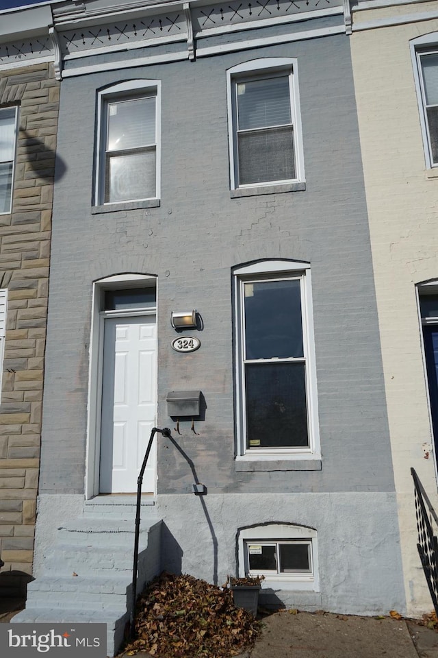 324 W 29th St, Baltimore, MD 21211 - view of front facade with brick siding