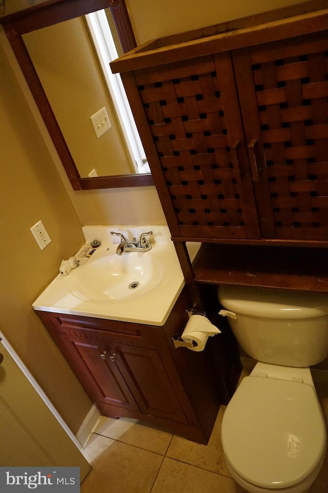 324 W 29th St, Baltimore, MD 21211 - bathroom featuring tile patterned flooring and vanity