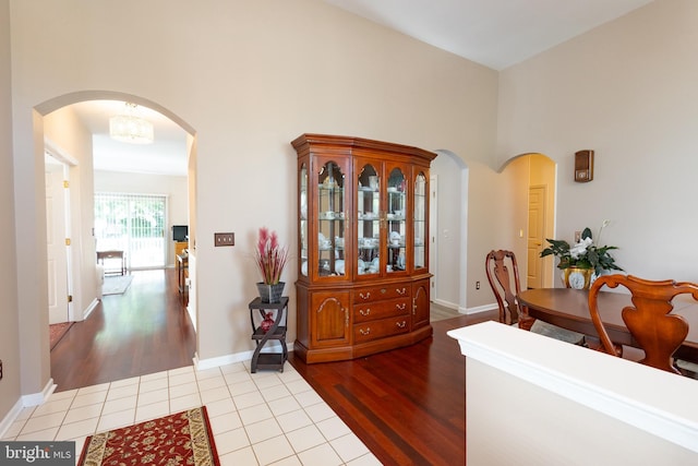 39 Mission Way, Barnegat, NJ 08005 - dining area with arched walkways, wood finished floors, and a high ceiling