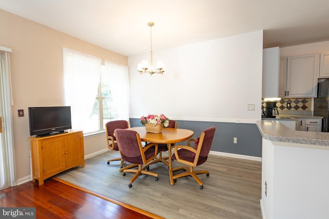 39 Mission Way, Barnegat, NJ 08005 - dining area with wood finished floors and a chandelier