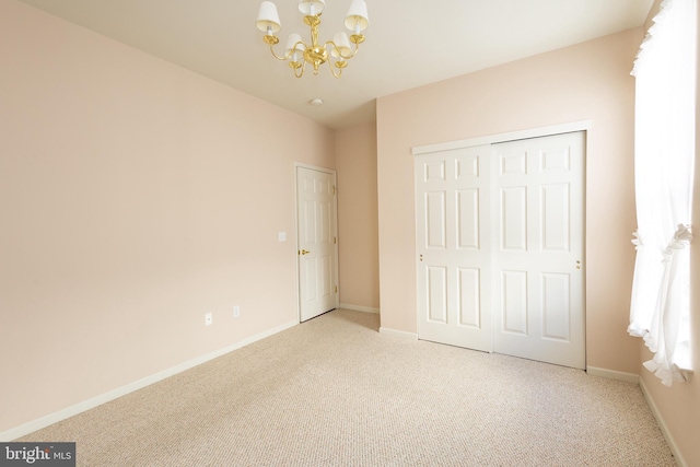 39 Mission Way, Barnegat, NJ 08005 - unfurnished bedroom with carpet flooring, a chandelier, and a closet