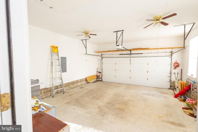 39 Mission Way, Barnegat, NJ 08005 - garage featuring electric panel, a ceiling fan, and a garage door opener