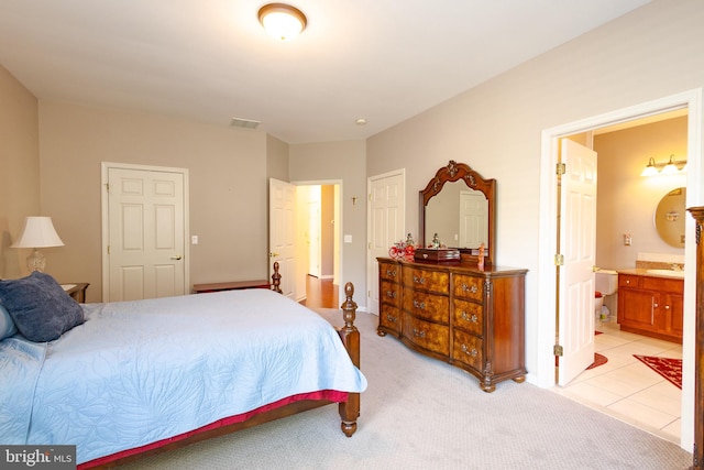39 Mission Way, Barnegat, NJ 08005 - bedroom featuring ensuite bath, light colored carpet, and light tile patterned flooring