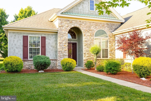 39 Mission Way, Barnegat, NJ 08005 - view of front of home featuring stucco siding, stone siding, a front yard, and a shingled roof