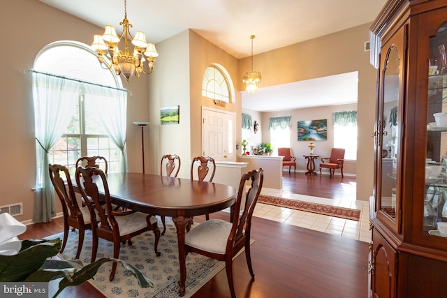 39 Mission Way, Barnegat, NJ 08005 - dining area with a chandelier, healthy amount of natural light, and wood finished floors