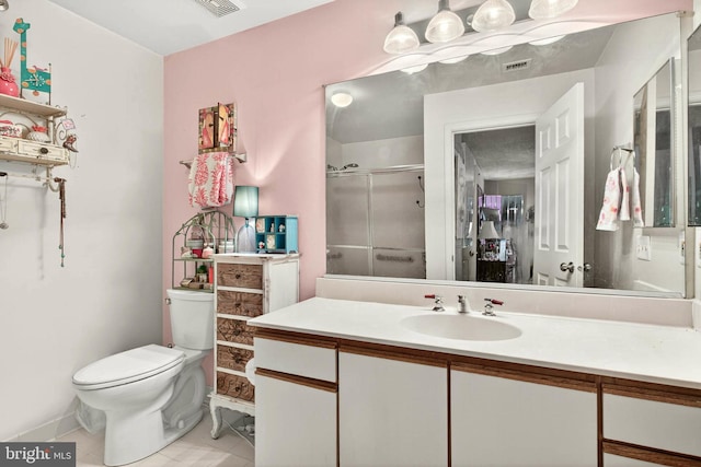 16 Rainflower Path Unit 204, Sparks Glencoe, MD 21152 - bathroom featuring a stall shower, vanity, and tile patterned flooring