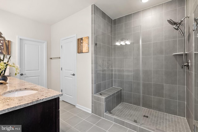 20318 Peacemaker Dr, Germantown, MD 20874 - bathroom featuring a tile shower, vanity, and tile patterned flooring