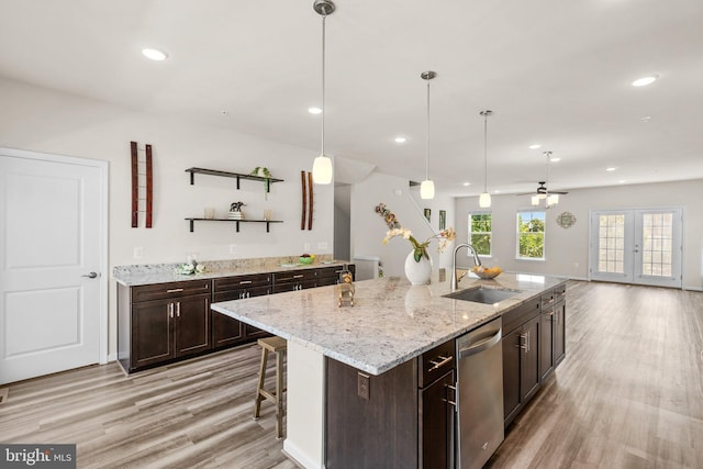 20318 Peacemaker Dr, Germantown, MD 20874 - kitchen with dishwasher, open shelves, light wood finished floors, recessed lighting, and open floor plan