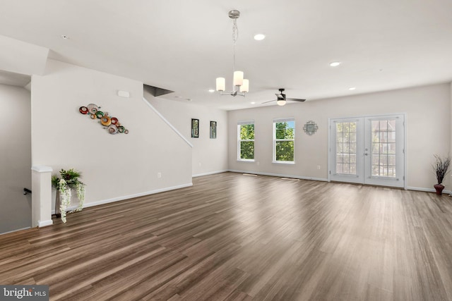 20318 Peacemaker Dr, Germantown, MD 20874 - unfurnished living room with a chandelier, wood finished floors, recessed lighting, a ceiling fan, and french doors