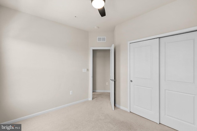 20318 Peacemaker Dr, Germantown, MD 20874 - unfurnished bedroom with light carpet, a closet, and ceiling fan