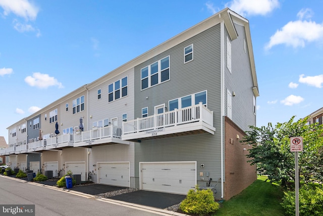 20318 Peacemaker Dr, Germantown, MD 20874 - back of house featuring a residential view and a garage