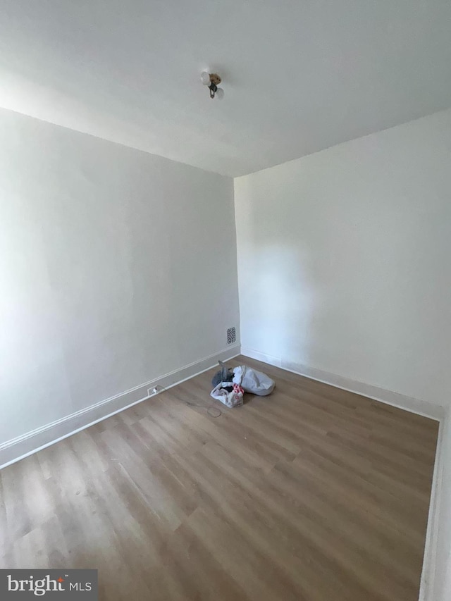 4335 N 15th St, Philadelphia, PA 19140 - unfurnished room featuring wood finished floors and baseboards