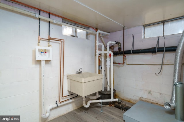 995 N Mildred St, Ranson, WV 25438 - below grade area featuring wood finished floors and a sink